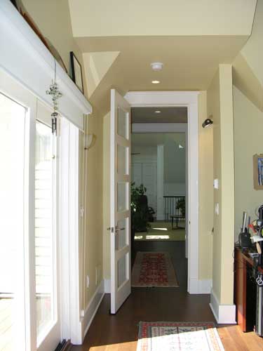 hallway from loft area overlooking living room