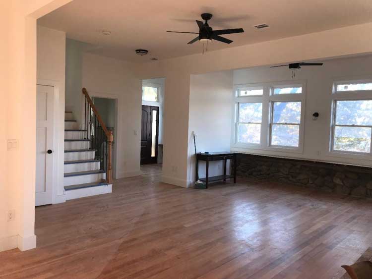 mail room of new house with stone wall